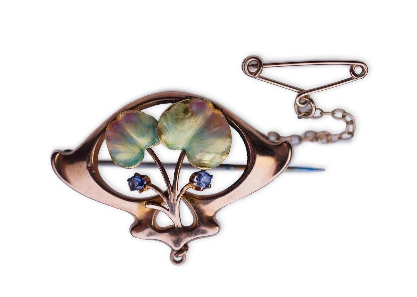 An attractive Art Nouveau enamel, sapphire and seed pearl brooch, early 20th century